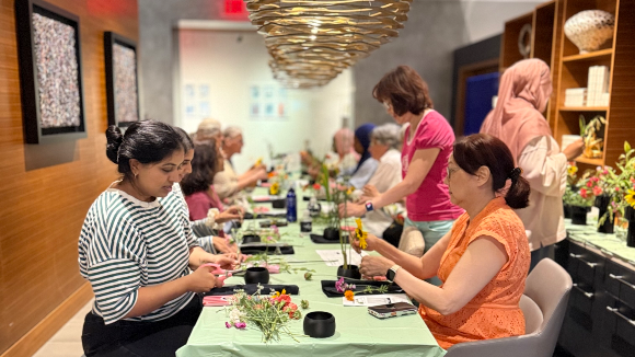 Artist Maryamm Abdullah joining a Narcisa Art Studio Ikebana workshop class at Tephra ICA Reston